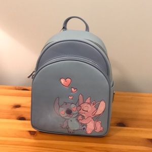 Stitch and Angel Loungefly Backpack NWT but faded